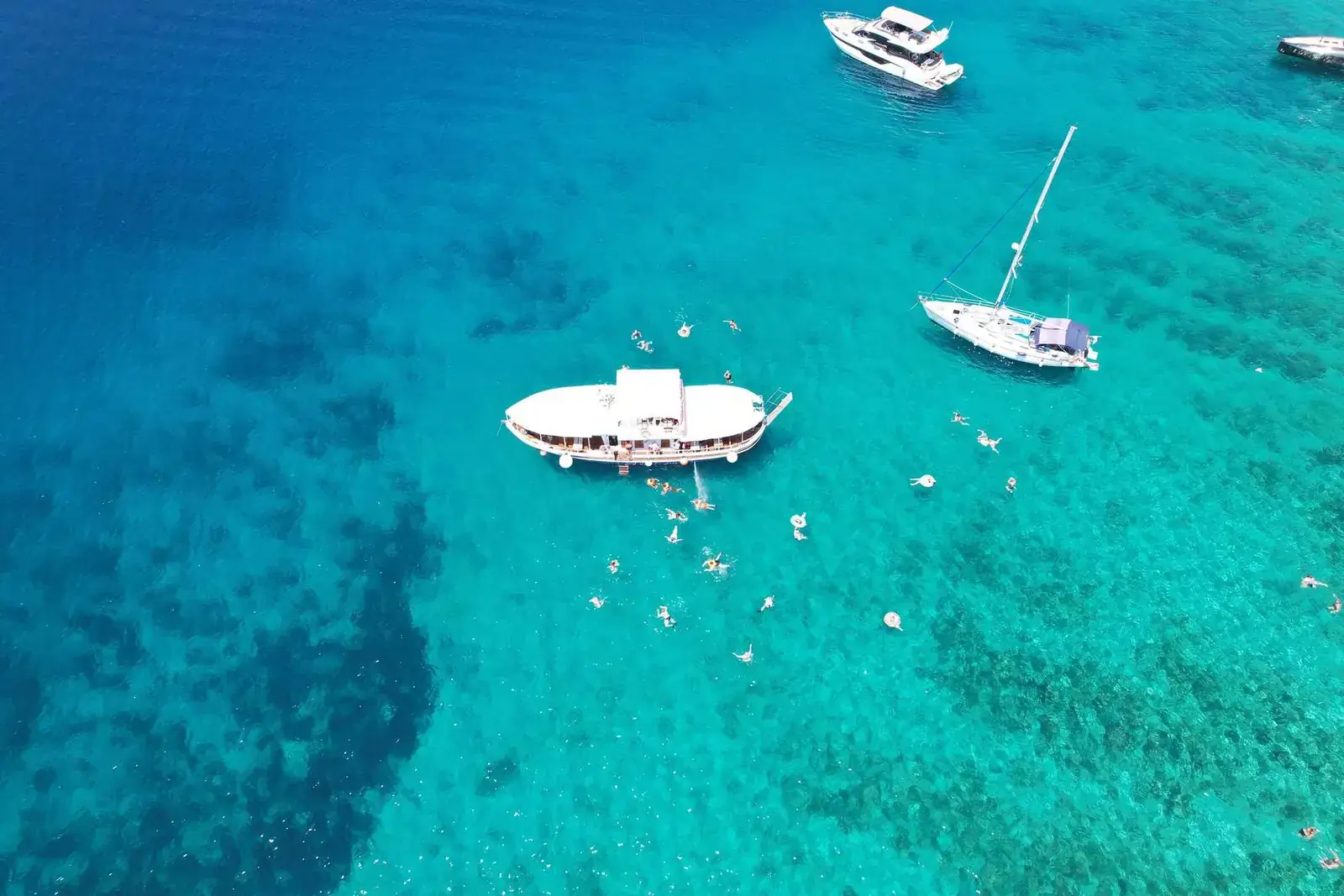 20-meter traditional wooden gajeta boat moored at Stobreč Harbor preparing to depart for the Blue Lagoon